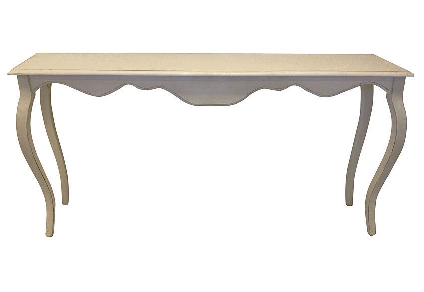 A white table with curved legs on a white background.