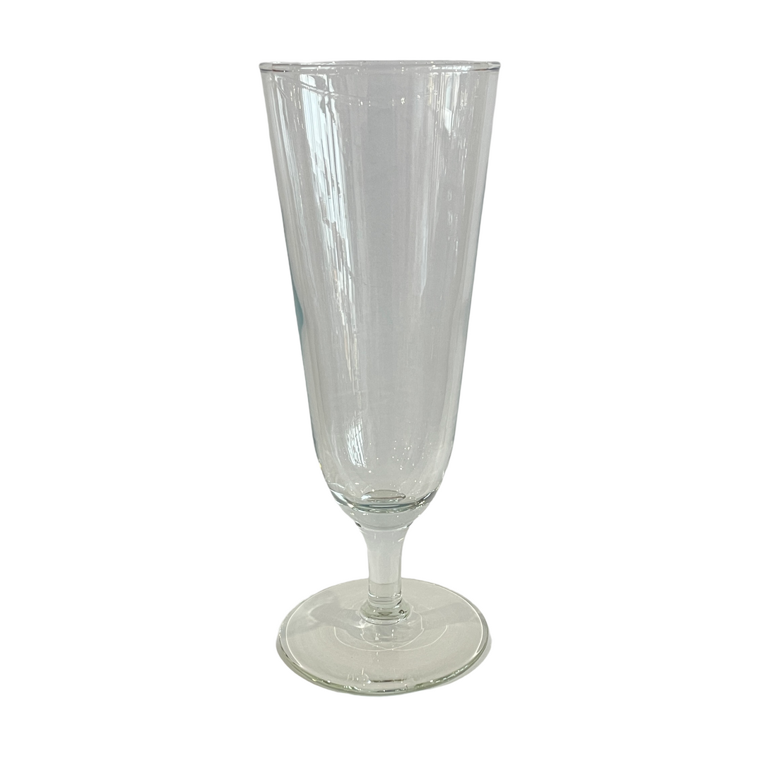 A clear glass wine glass on a white background.