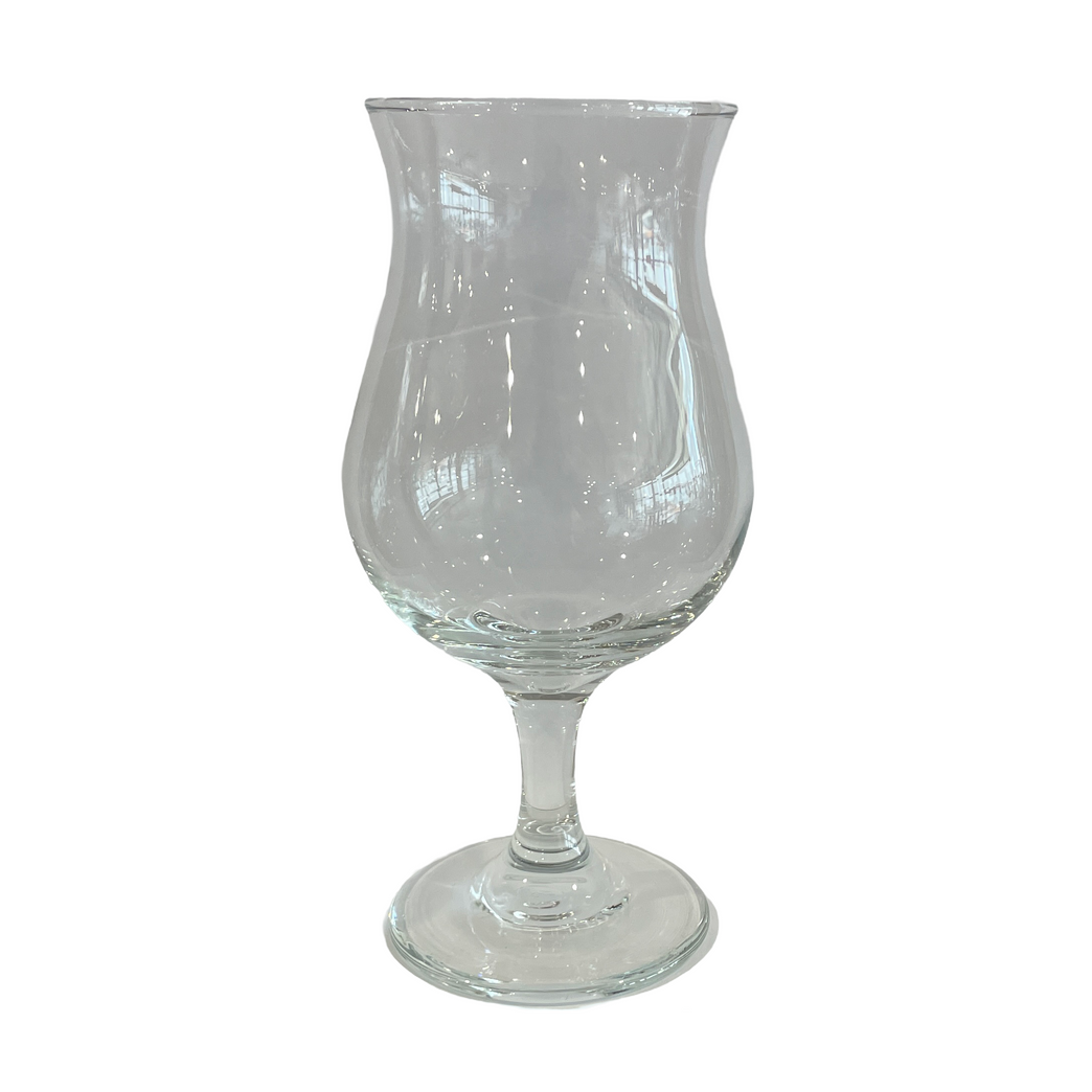 A clear glass wine glass on a white background.
