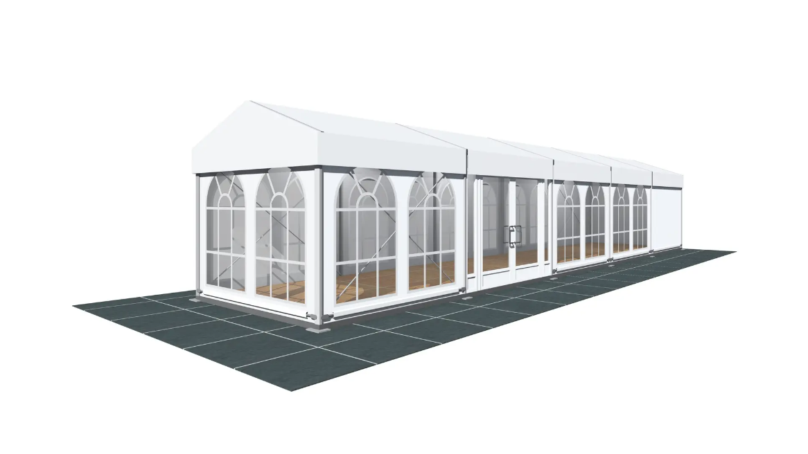 A white tent is sitting on top of a black mat on a white background.