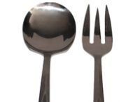 A spoon and fork on a white background.