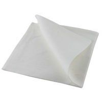 A white napkin folded in half on a white background.
