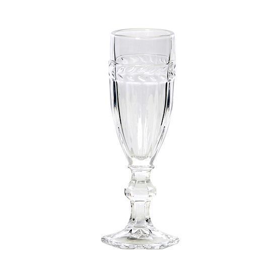 A clear glass champagne flute with a floral design on a white background.