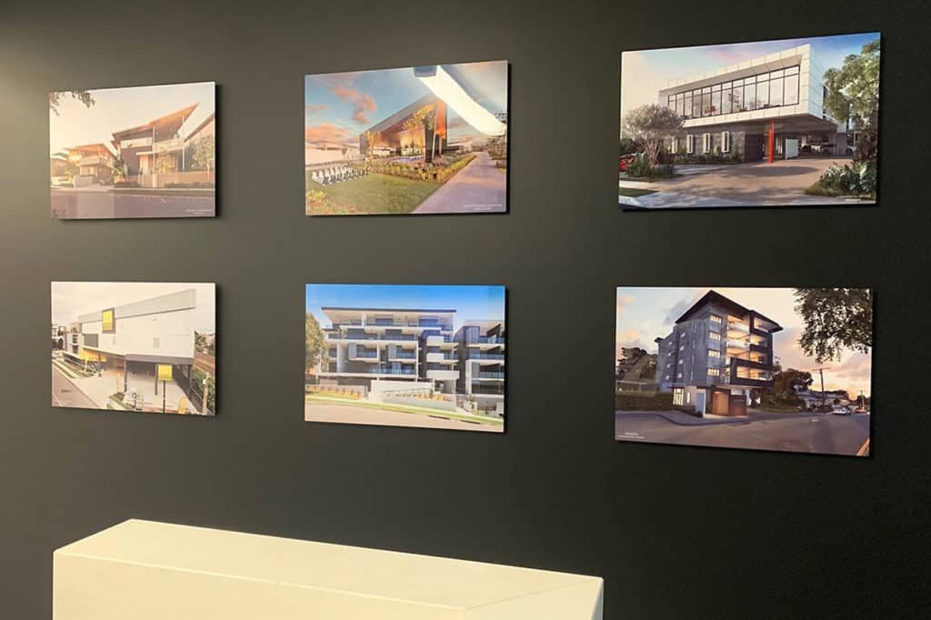 There Are Many Pictures of Buildings on the Wall — Gold Coast Printing & Framing in Burleigh Heads, QLD