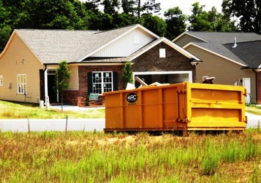 Residential Dumpster Rental in Driveway