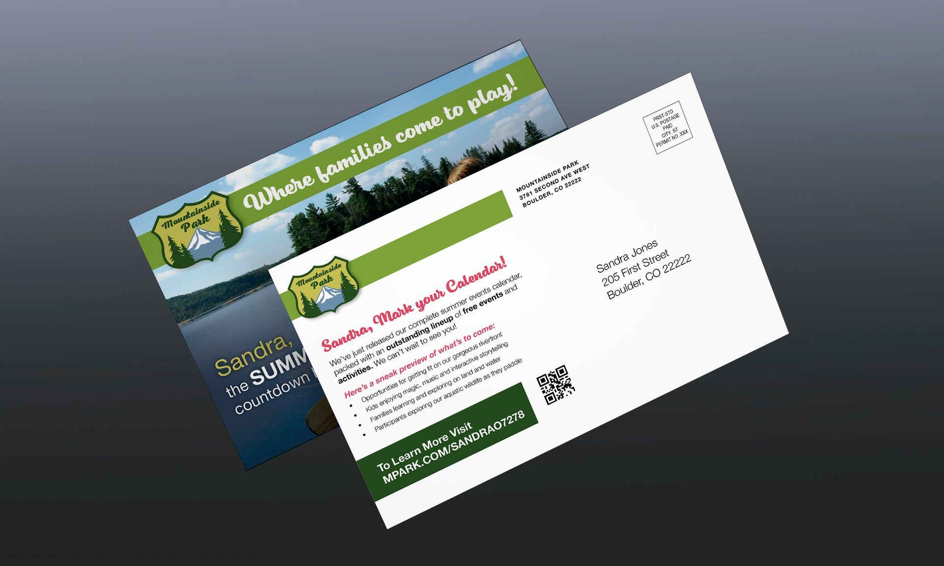 Two postcards are sitting on top of each other on a table.