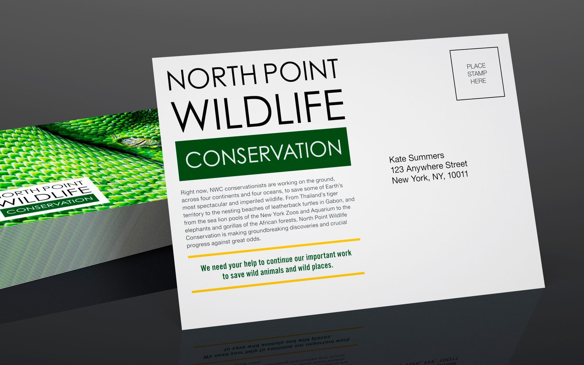 A postcard from north point wildlife conservation is sitting on a table.