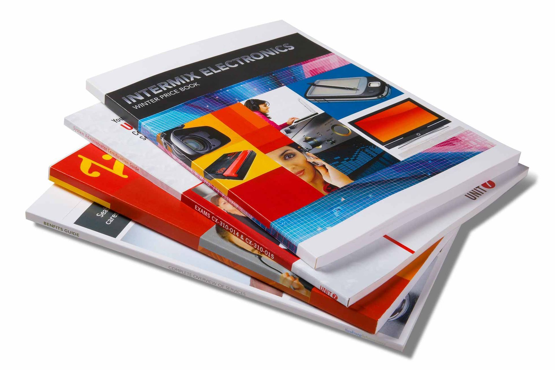 Three books are stacked on top of each other on a white background.