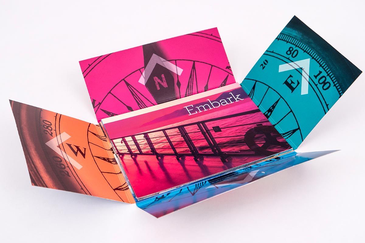 A bunch of cards are stacked on top of each other