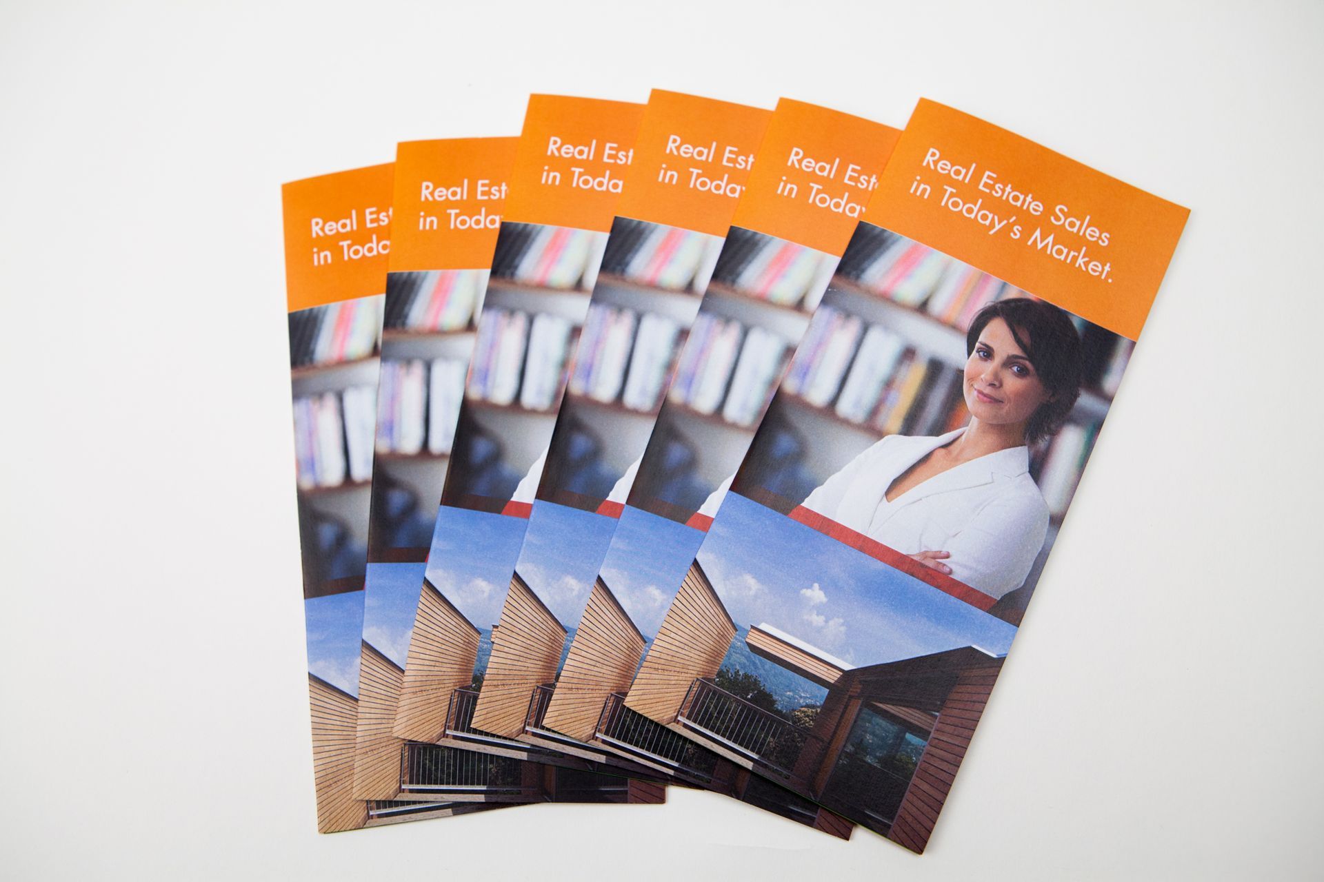 A stack of pamphlets with a woman on them