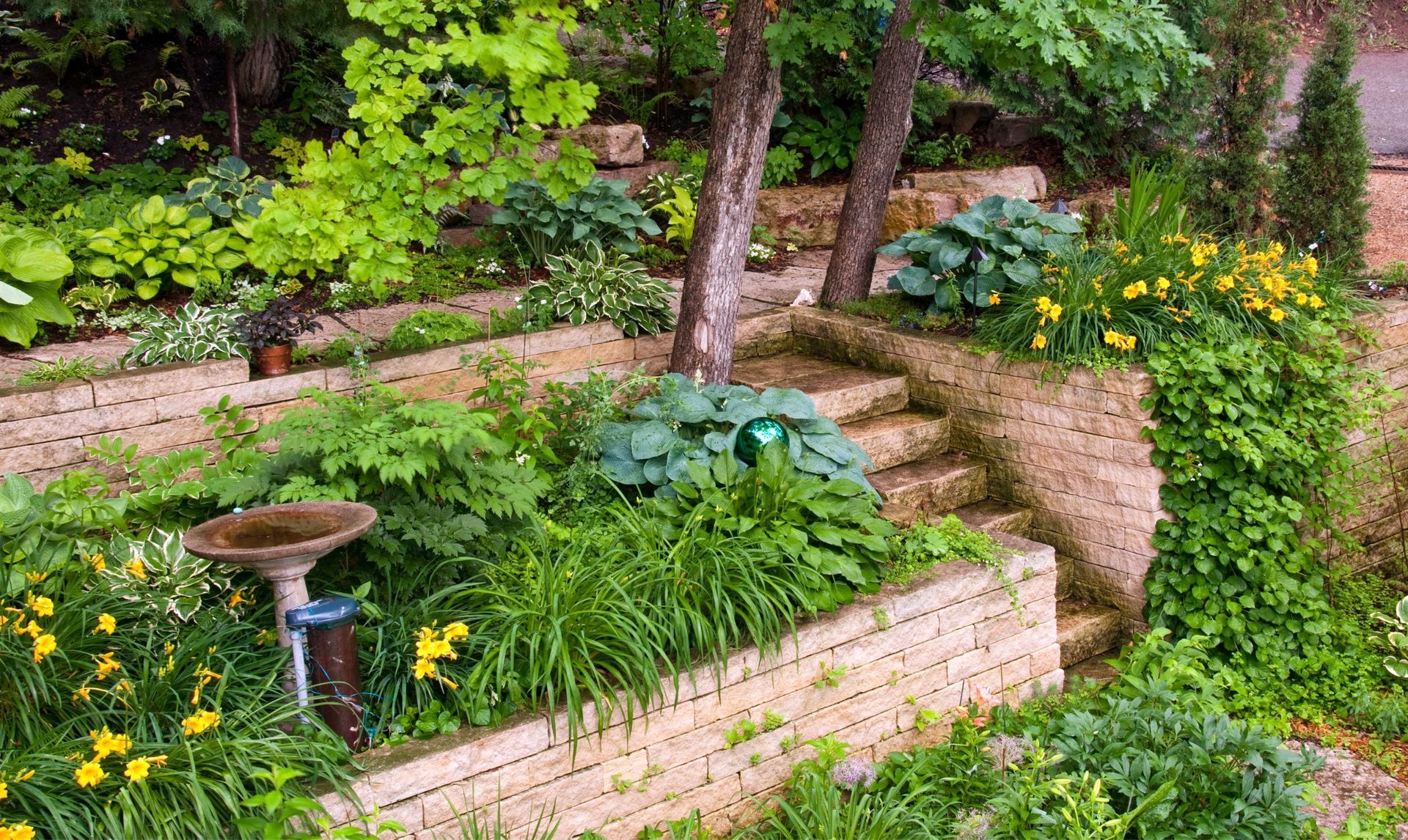 Retaining wall with lush greenery garden. Retaining wall with lush greenery garden.