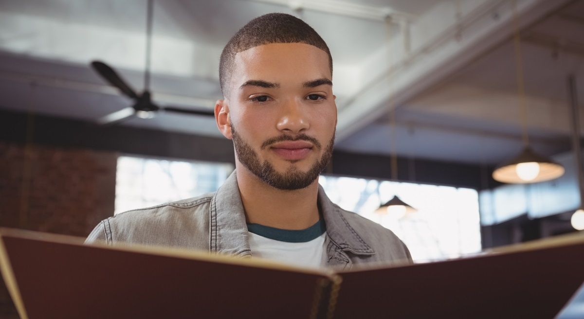 man-reading-eulogy-tribute-church-funeral-memorial