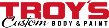 Red "TROY'S" text with "Custom BODY & PAINT" below in black, logo for a body shop.