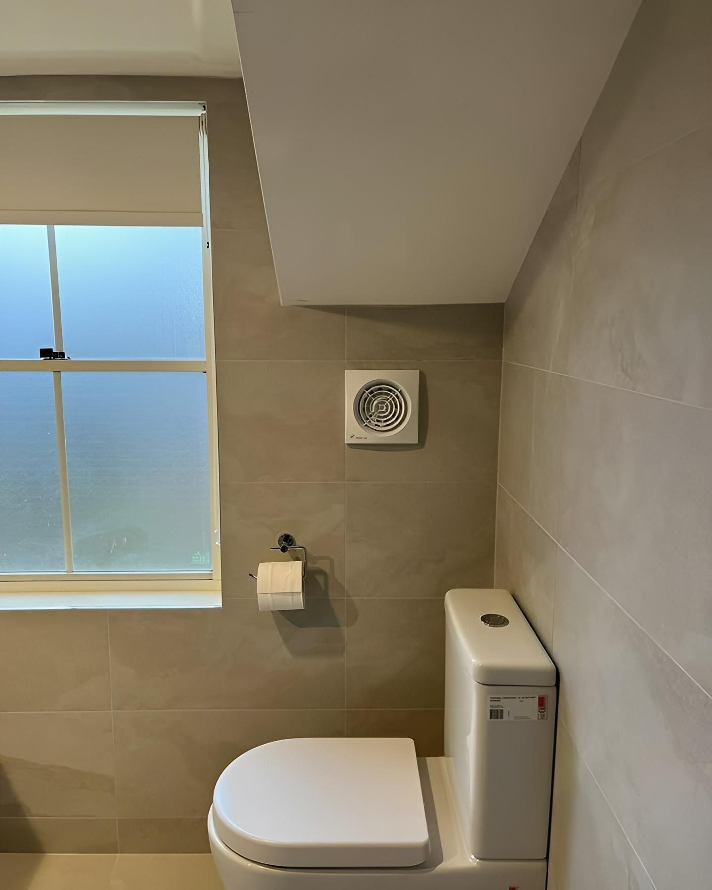 An After Image of Bathroom with A Toilet and A Window — Bowral Bathrooms in Exeter, NSW