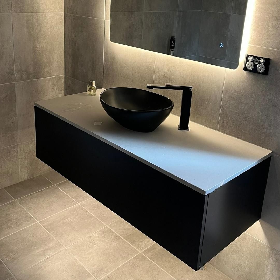 A Bathroom with A Black Sink and A Mirror — Bowral Bathrooms in Exeter, NSW