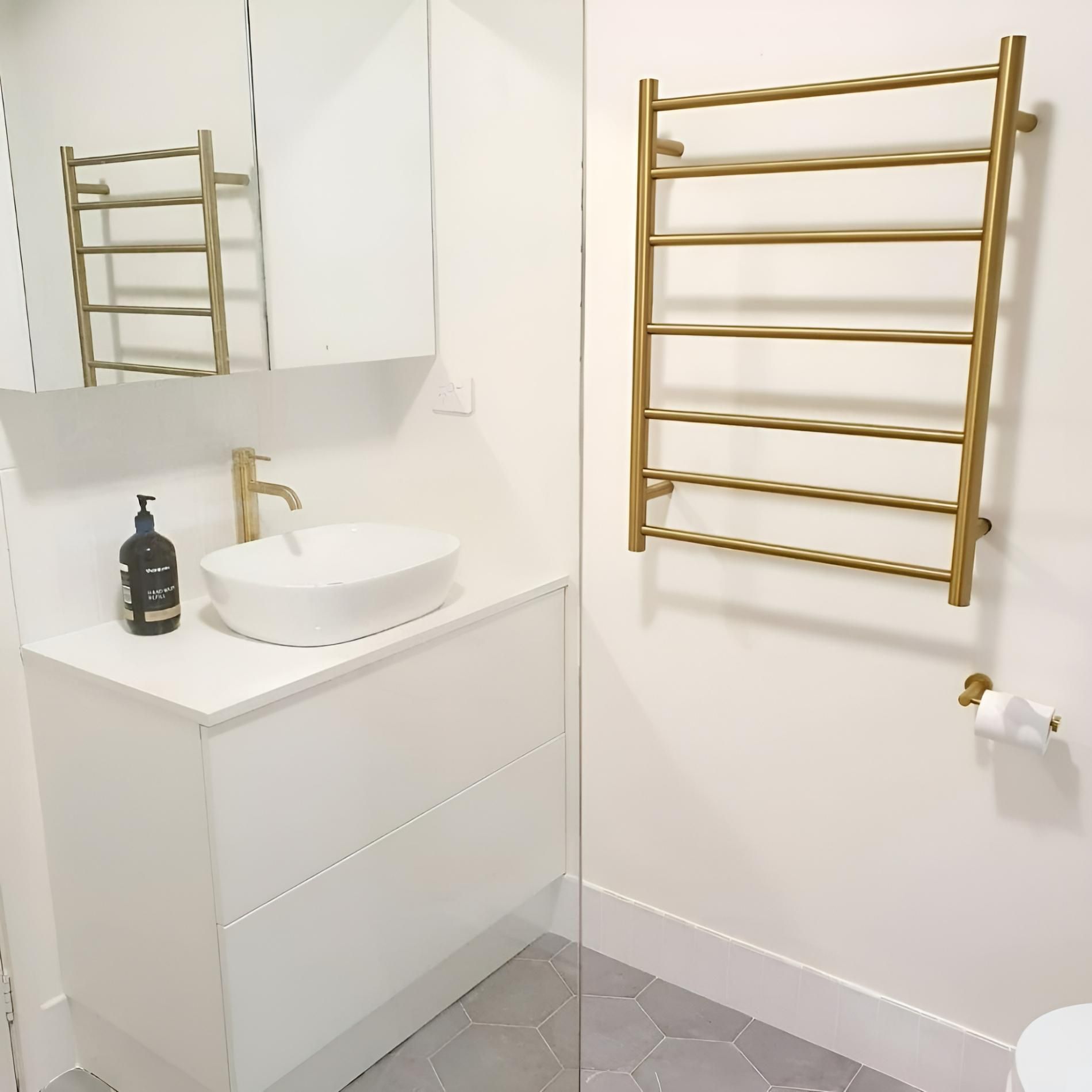 An After Image of Bathroom with A Sink and A Towel Rack — Bowral Bathrooms in Exeter, NSW