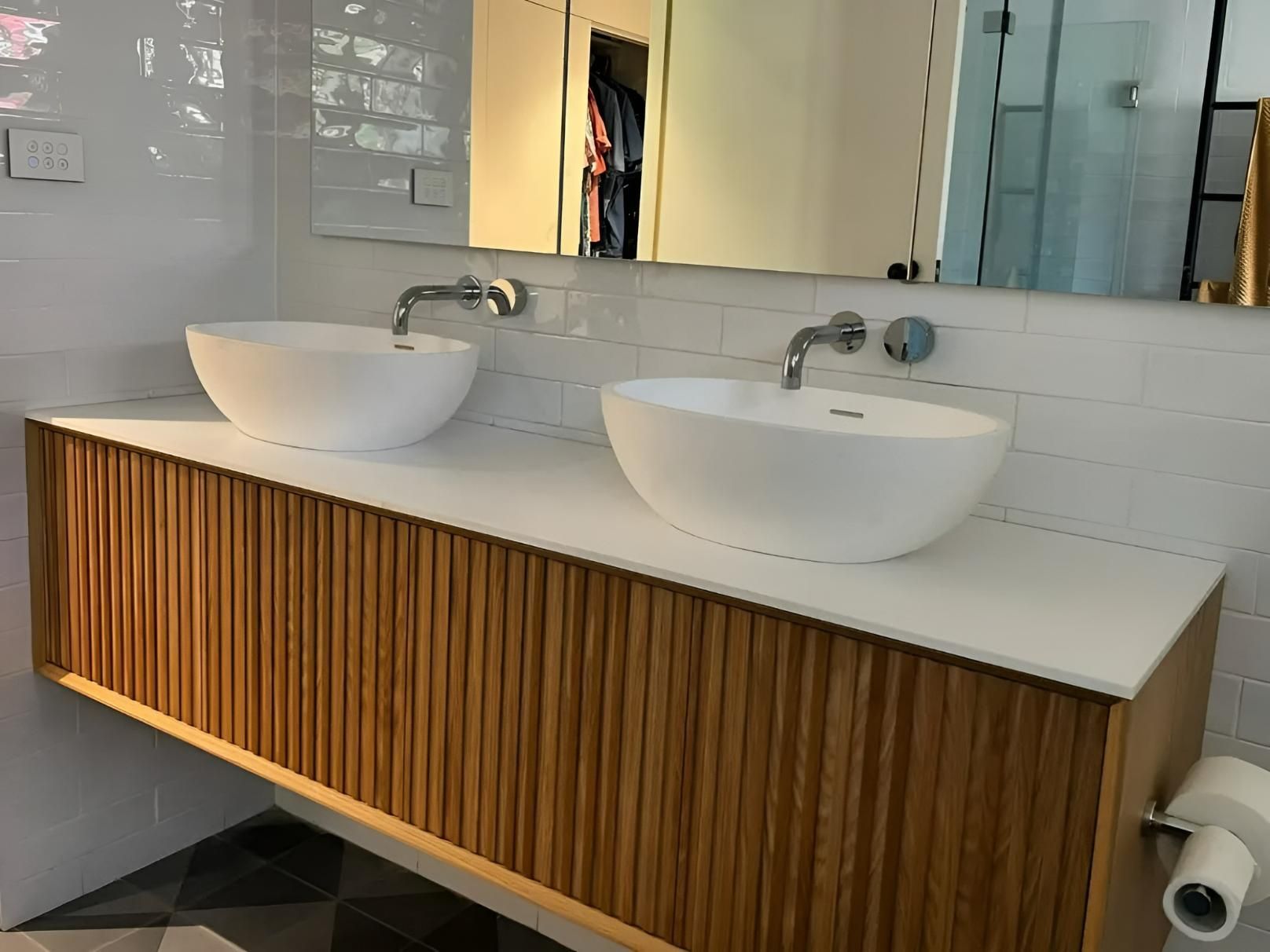 A Bathroom with Two Sinks and A Mirror — Bowral Bathrooms in Exeter, NSW