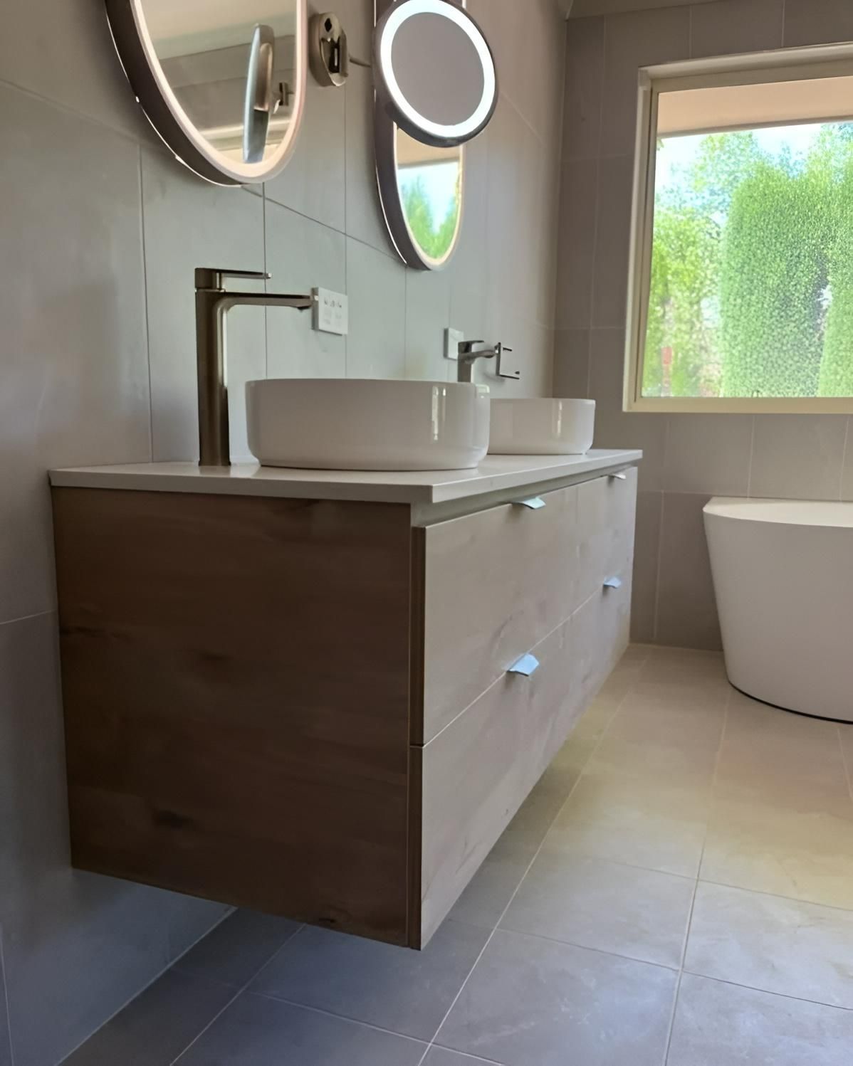 A Bathroom with Two Sinks, Two Mirrors and A Tub — Bowral Bathrooms in Exeter, NSW
