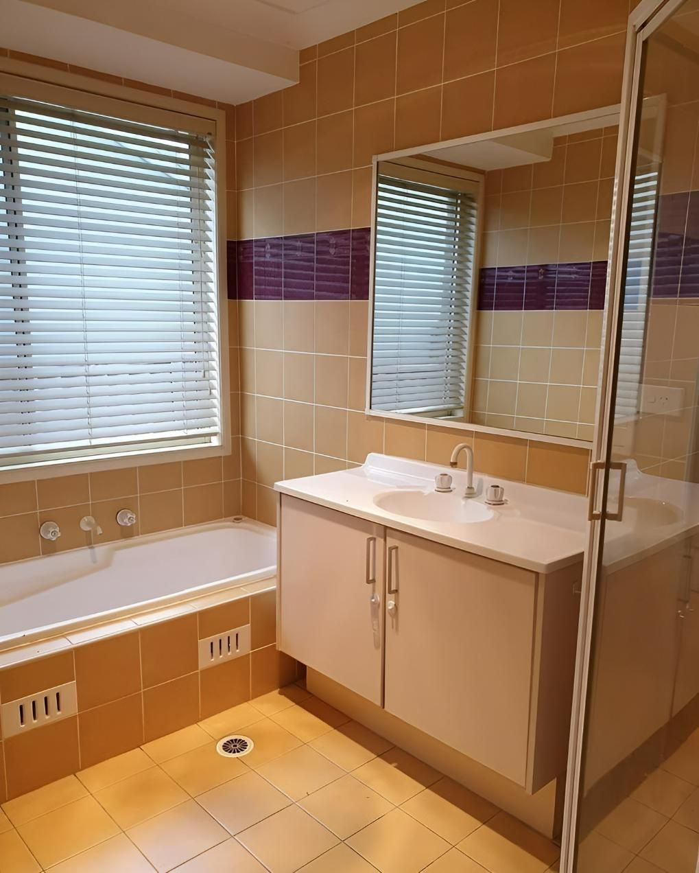 A Before Image of Bathroom with A Sink a Tub and A Mirror — Bowral Bathrooms in Exeter, NSW