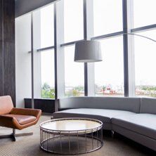 Office area displaying hanging light fixtures installed by Nightlight Electric Company