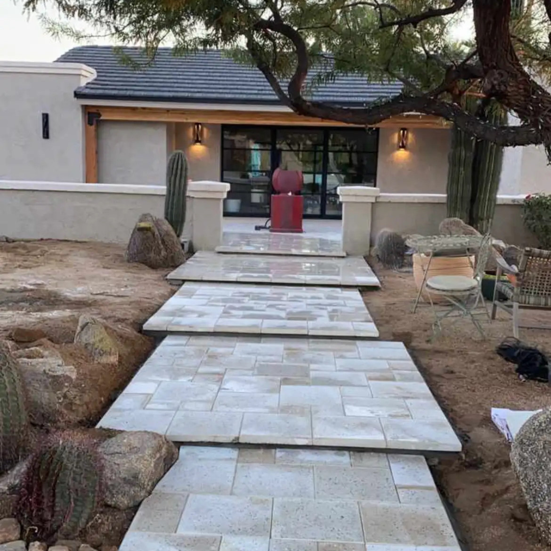 A house with a walkway leading to it