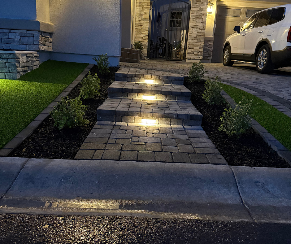 A car is parked on the side of the road in front of a house