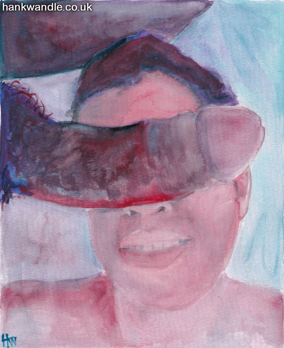 an impressively big penis rests over the eyes of a very happy looking young man