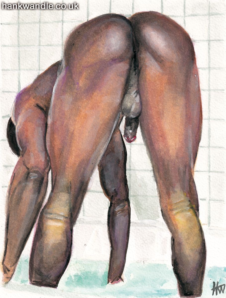 a naked male stands in a full foamy bath, he bends fully at the waist showing his muscular legs, his genitals show through his legs