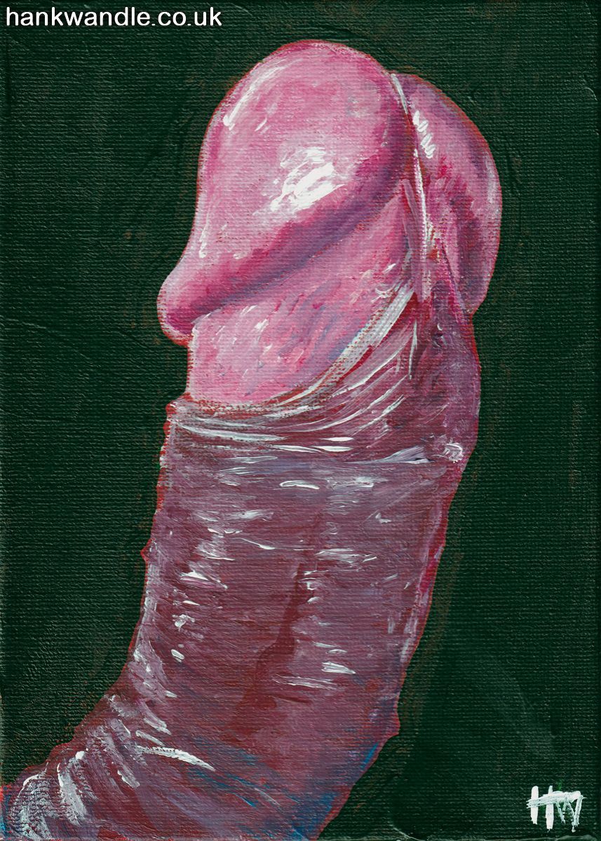 a thick uncut erect penis against a dark green background