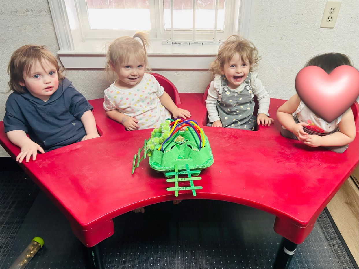 boy in front of cubes with colorful lights