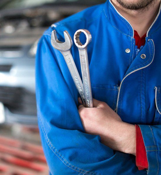 Repair Man Holding a Wrench — Holly Hill, FL — Whitt Automotive for Auto Repair Services