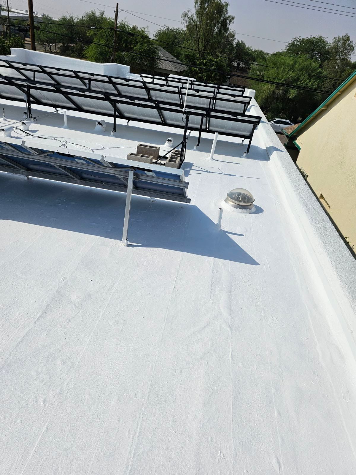 A roof with a lot of solar panels on it