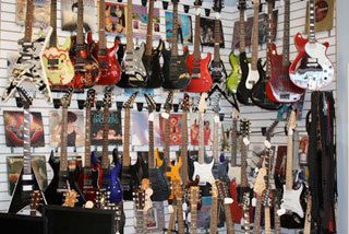 guitars on display at pawn shop in Fort Bragg, NC
