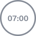 Minuteur circulaire gris affichant 07:00 sur fond blanc