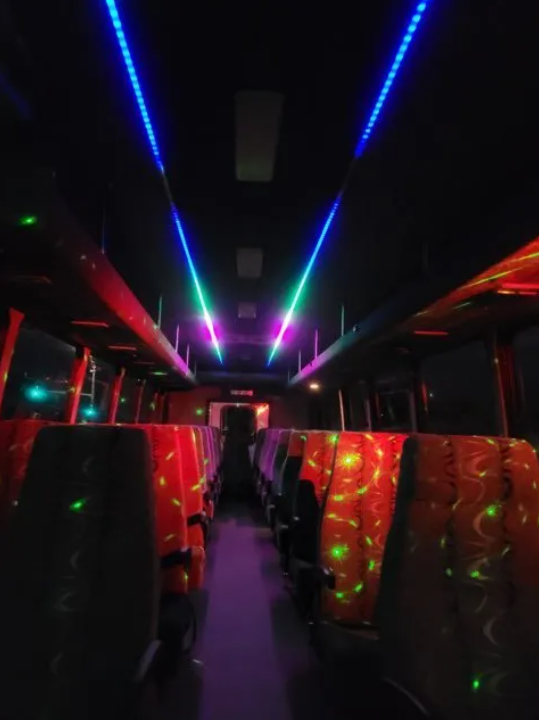 San Antonio  Shuttle Bus Service 37 passengers inside view with lights on