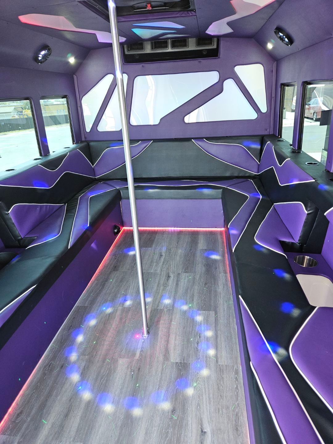 inside view of a white 20 passenger party bus for SATX