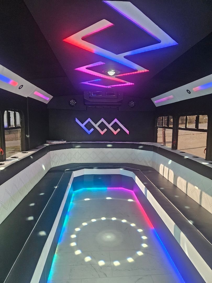 inside view of a white 20 passenger party bus for SATX