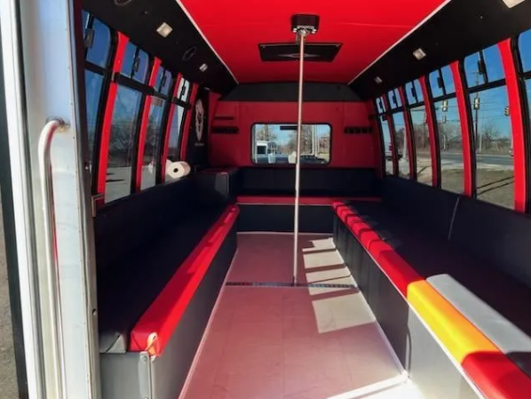 pink Austin party bus inside view