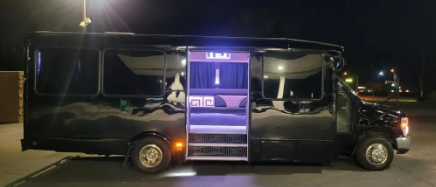 black Boerne party bus with 14 passengers outside view