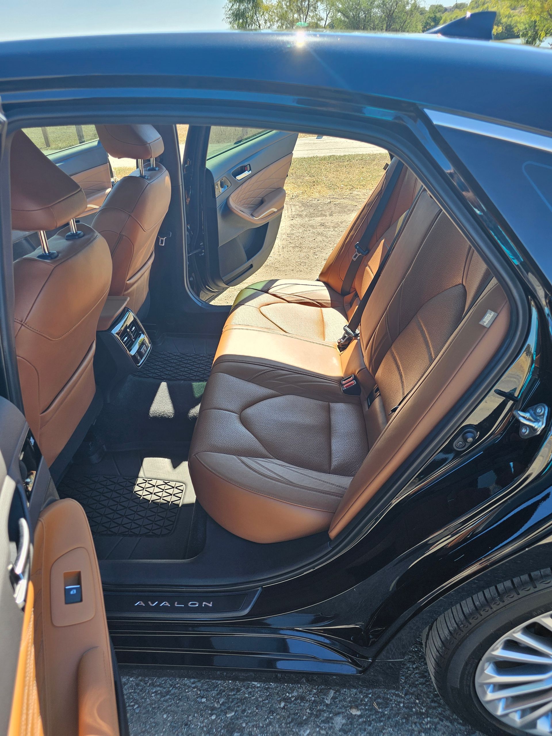 Blue Line San Antonio Party Bus Up to 16 passengers nighttime inside lights on view parked in Leon Springs