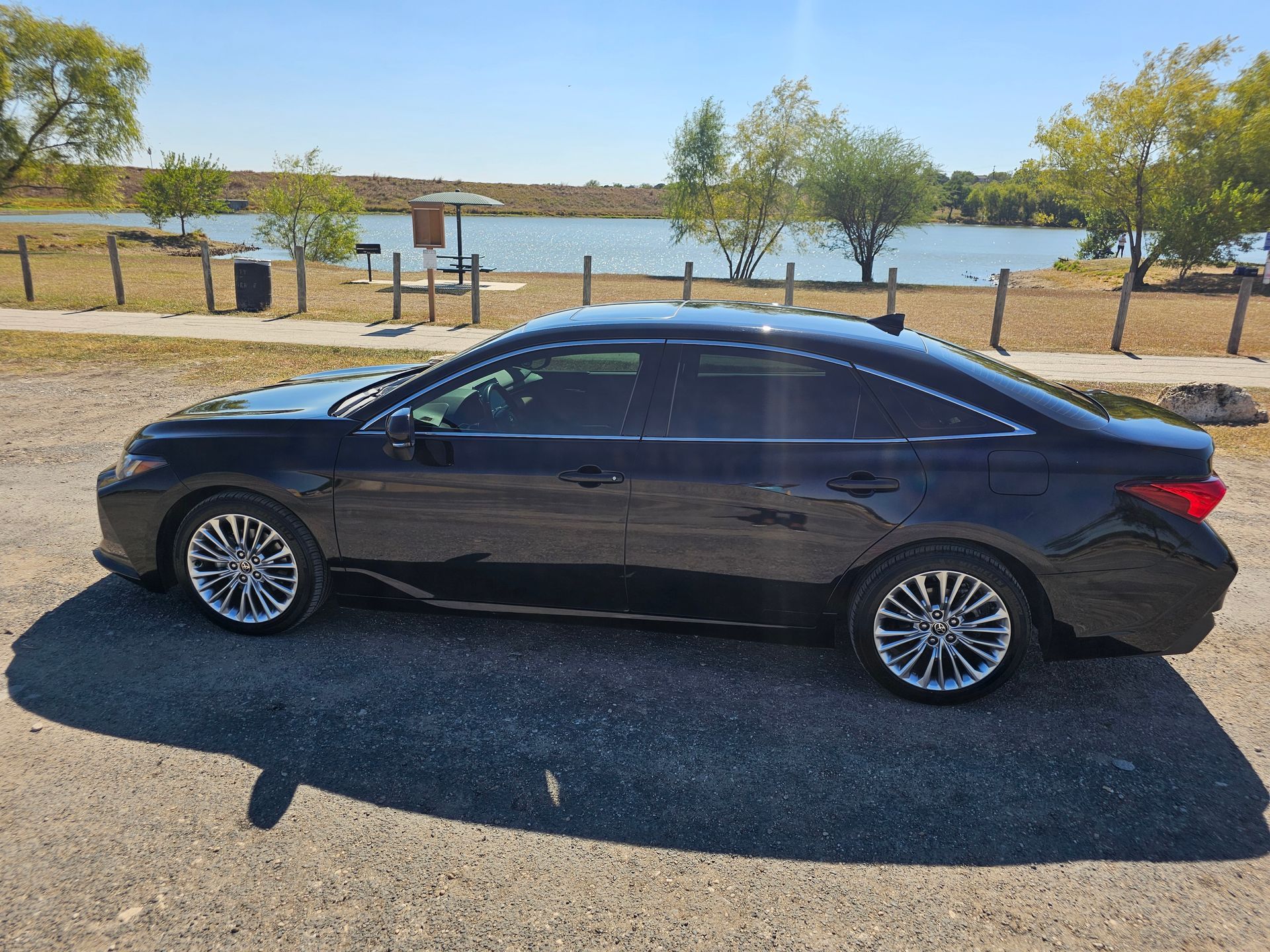 Blue Line San Antonio Party Bus Up to 16 passengers daytime outside view parked in Leon Springs