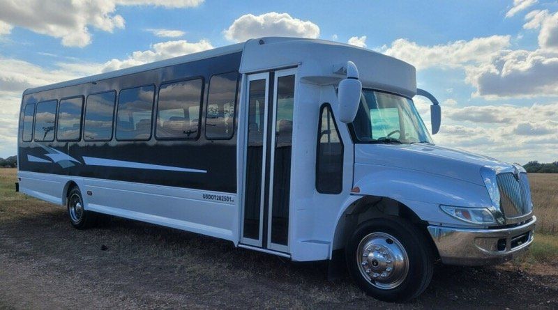 San Antonio Executive shuttle bus for up to 37 passengers outside view SATX