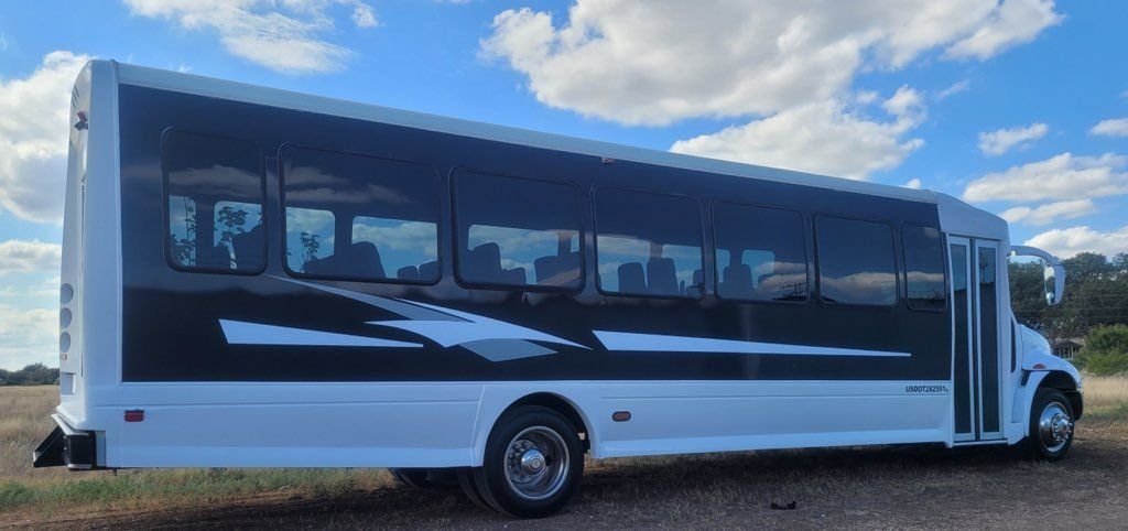 San Antonio Executive shuttle bus for up to 37 passengers outside view SATX