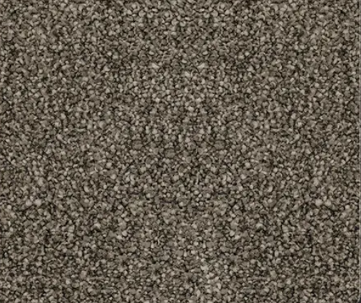 Gravel surface, gray and beige small stones tightly packed together.