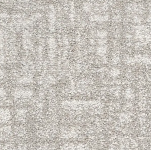Close-up of a light gray, textured carpet with a mottled appearance.