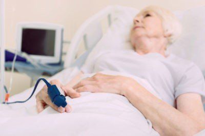 Senior Woman on Hospital Bed — Chattanooga, TN — Houston & Alexander, PLLC