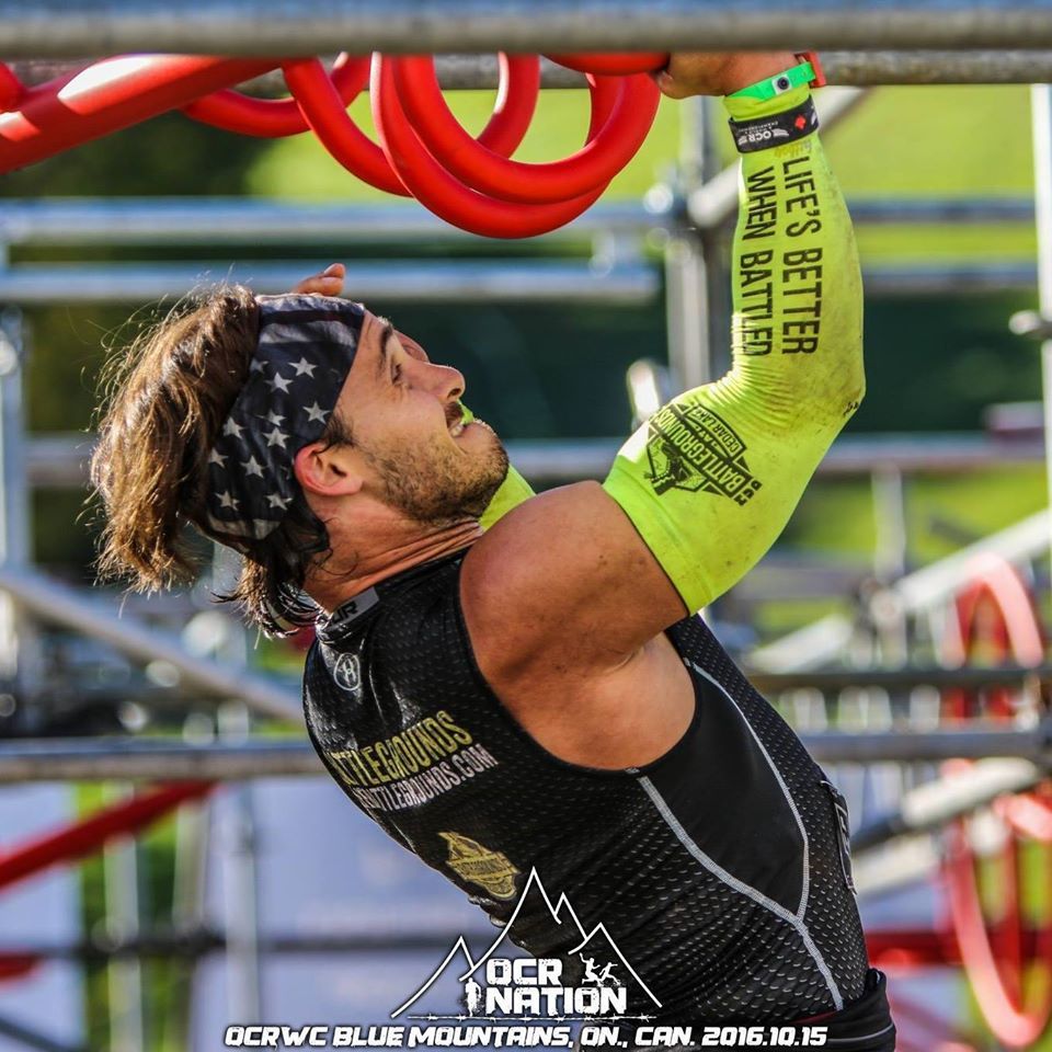 A man wearing a bandana and sleeves that say life 's better