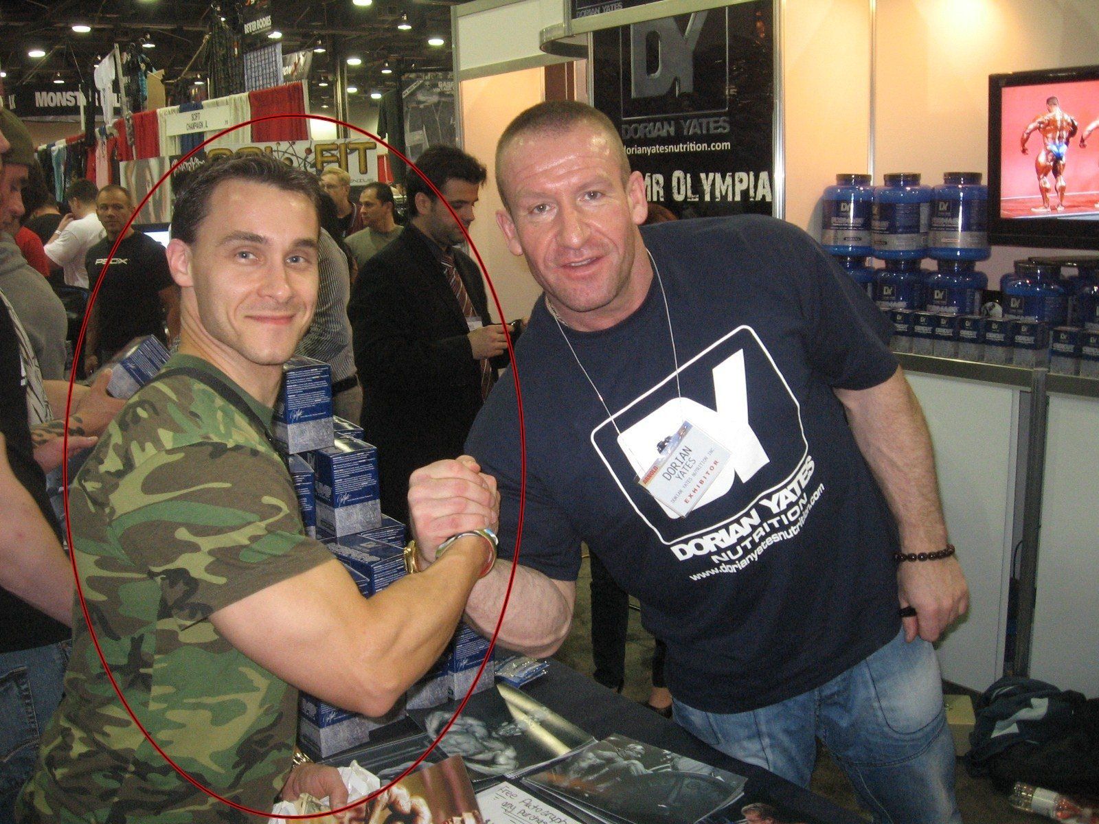 A man wearing a shirt that says olympia on it