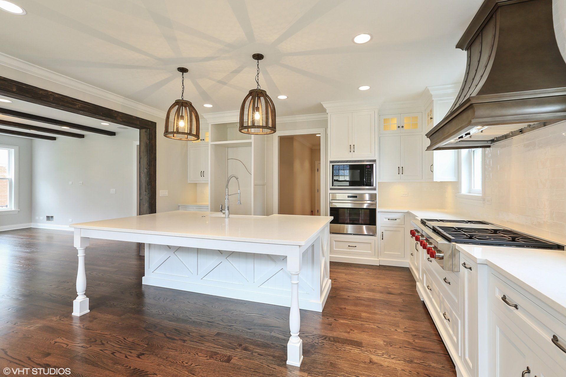 There is a large island in the middle of the kitchen.
