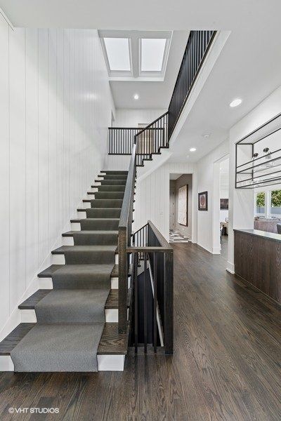 A staircase leading up to the second floor of a house